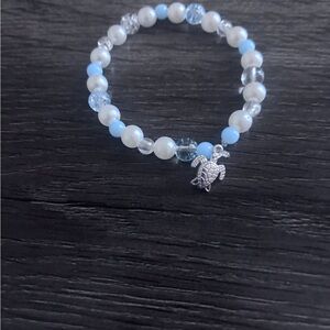 Blue bead and pearl bracelet clear beads turtle charm
